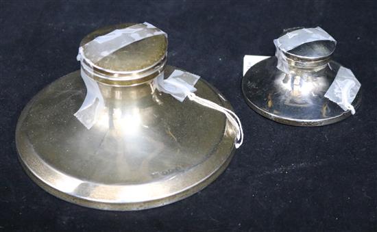 Two silver capstan inkwells (a.f.).